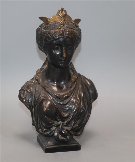 A bronze bust of a woman height 24cm